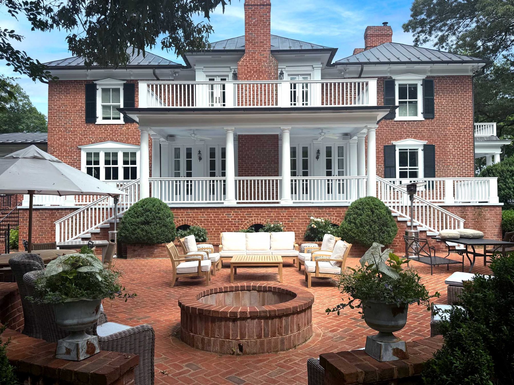 Brick residence with freshly painted porch and trim
