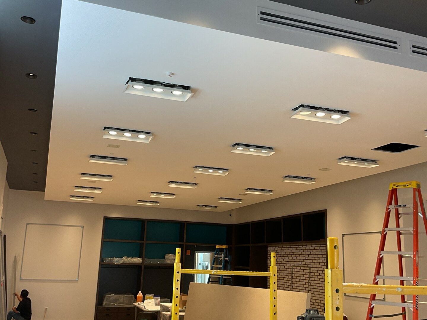 Level 5 ceiling and wall finish in a completed commercial interior